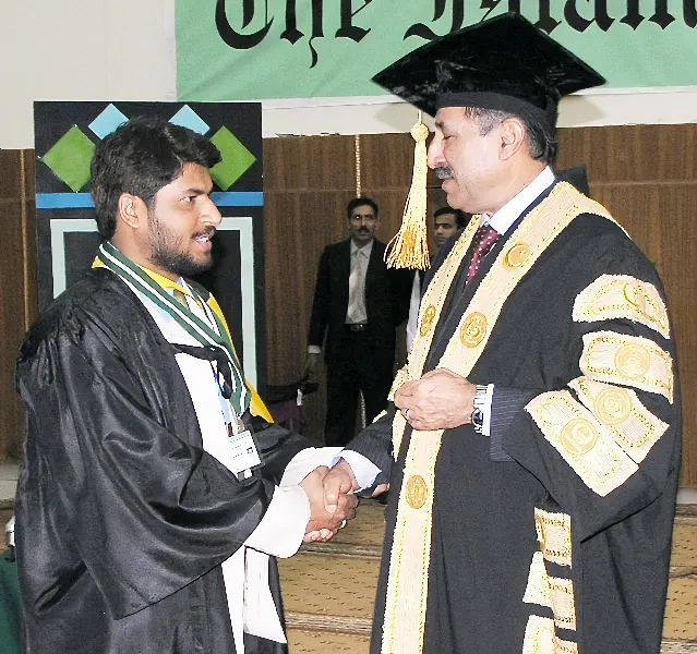 Herbalist Aamir Taking Medal from Governor of the Punjab Lt. Gen. Khalid Maqbool